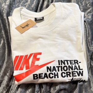 Nike White Tee with Red and Black Graphics